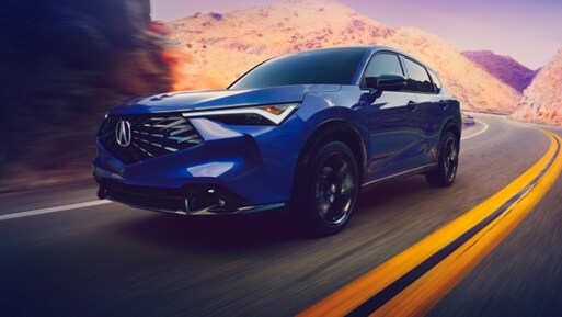 Adriatic Sea Blue Metallic色Acura 2025 ADX A-Spec搭載先進組合,在道路上行駛 Adriatic Sea Blue Metallic色Acura 2025 ADX A-Spec搭載先進組合,在道路上行駛