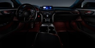 TLX 2022搭載A-Spec組合與Ebony色內裝,配有鈴木賽道環境照明主題。 TLX 2022搭載A-Spec組合與Ebony色內裝,配有鈴木賽道環境照明主題。