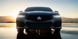 Liquid Carbon Metallic色2025 Acura TLX科技組合的活力十足外觀。 Liquid Carbon Metallic色2025 Acura TLX科技組合的活力十足外觀。