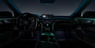 2025 Acura TLX A-Spec組合與Ebony色內裝,配有大西洋公路環境照明主題。 2025 Acura TLX A-Spec組合與Ebony色內裝,配有大西洋公路環境照明主題。