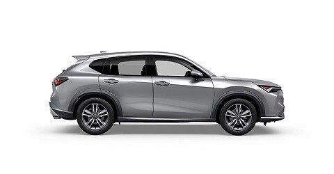 展示車款為Solar Silver Metallic色Acura 2026 ADX，側面視角（頂級小型SUV）。