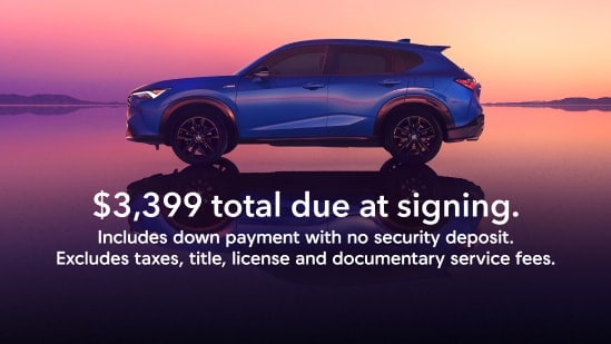 2026 Acura ADX in Adriatic Sea Blue Metallic profile on salt flats at sunset with reflection (Premium Compact SUV).